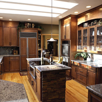 A contemporary kitchen setup with wooden cabinets.