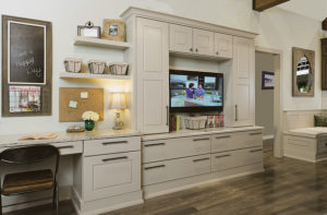 Wellborn Courtland cream color living room cabinet.