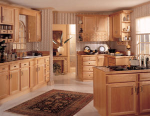 Wellborn Essex Oak brown kitchen cabinets.